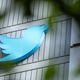 The Twitter logo is seen on a sign on the exterior of Twitter headquarters in San Francisco, California, on October 28, 2022. - After months of controversy, Elon Musk is now at the head of one of the most influential social networks on the planet, whose “tremendous potential” he has promised to unleash.